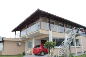 Гостиница Apartamento na Praia do Santinho  Флорианополис